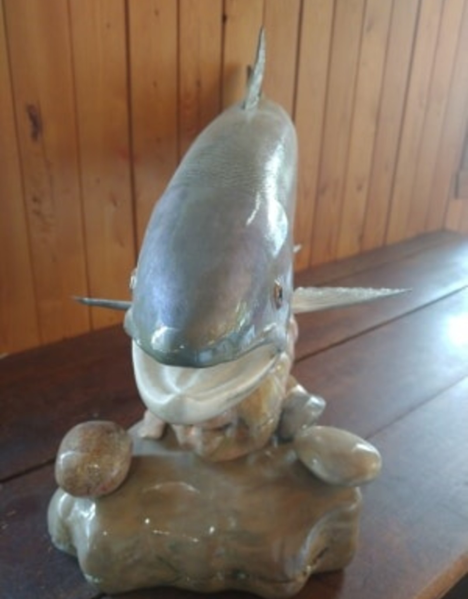 André Boucher Salmon sculpted on rocks