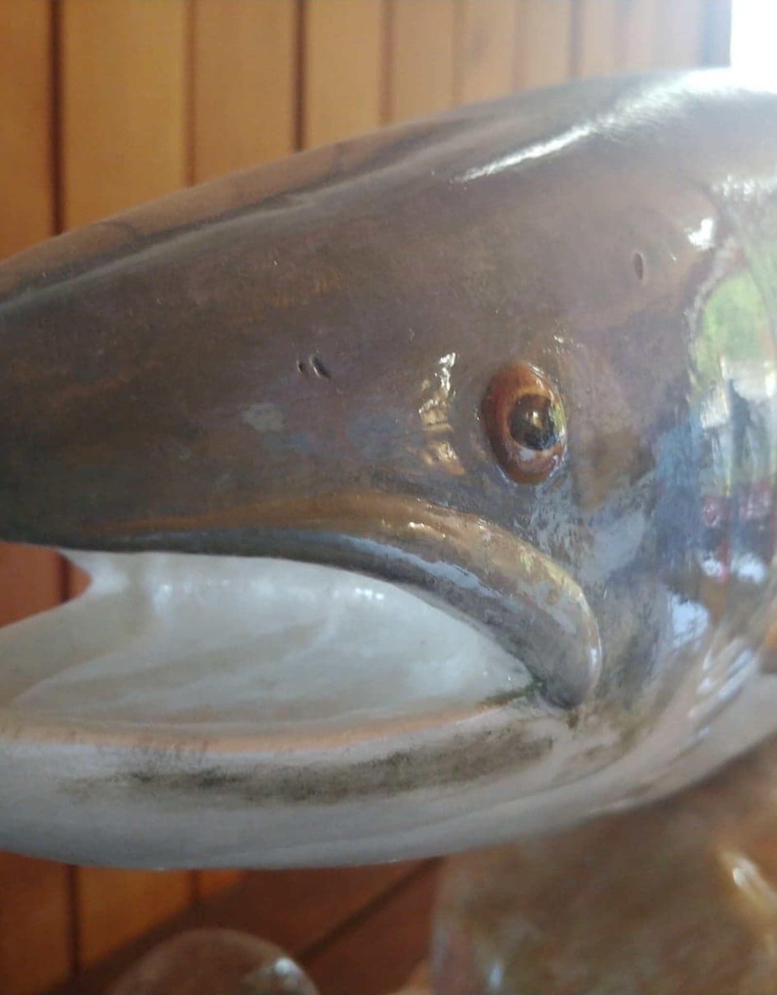 André Boucher Salmon sculpted on rocks