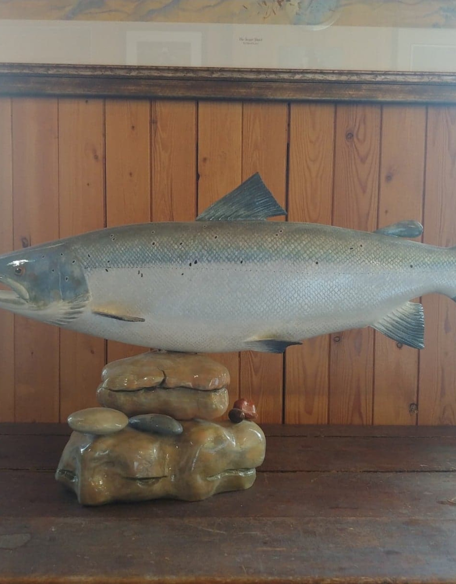 André Boucher Salmon sculpted on rocks