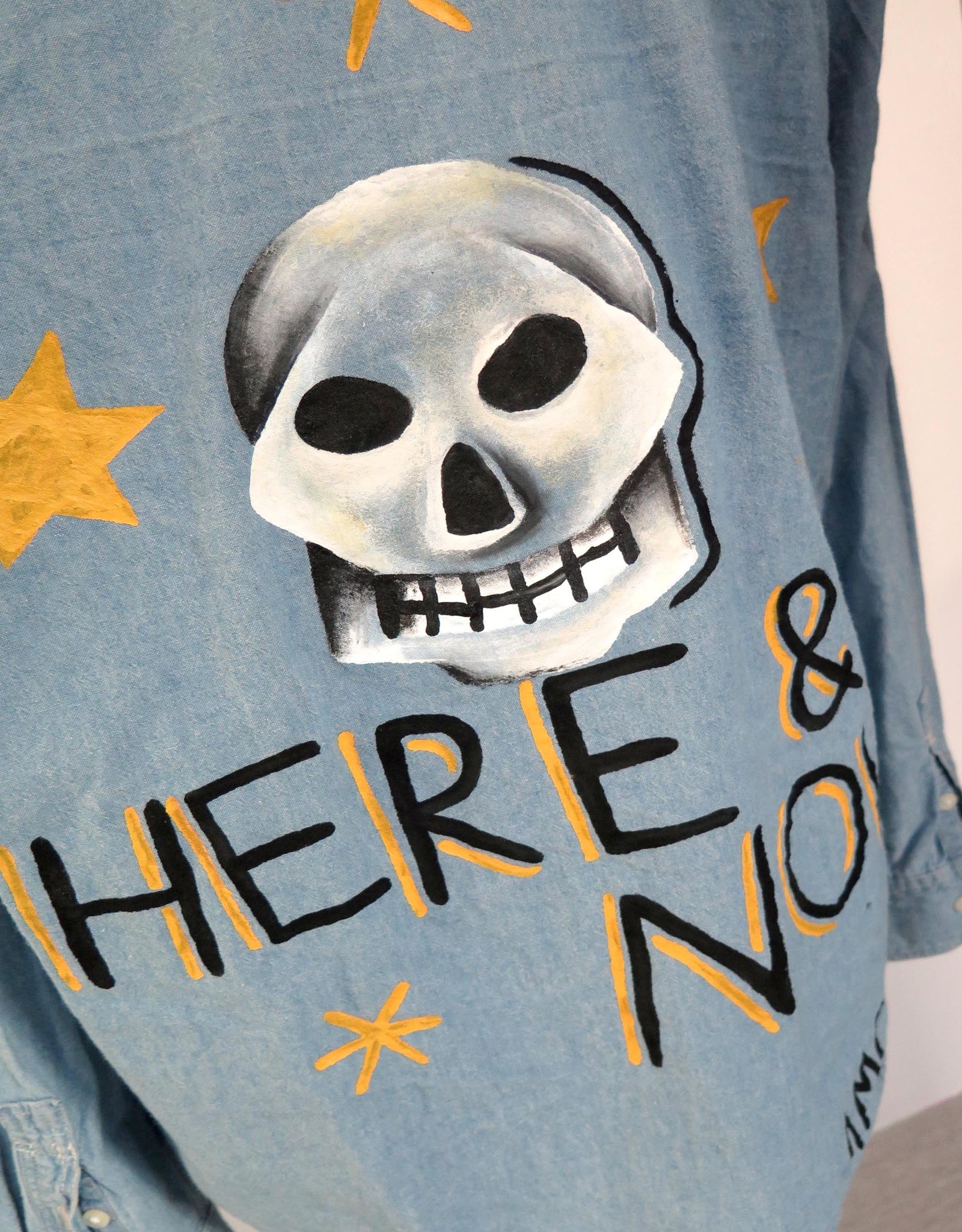 AMCV “Here & Now” textile paint on denim shirt by AMCV