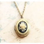 A Pocket of Posies Pocket of Posies Cameo Locket Necklace Ivory and Black Flower