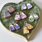 the broken plate co The Broken Plate Dangle Earring  Shard Shape Mixed Patterns Rose Gold Porcelain Paint