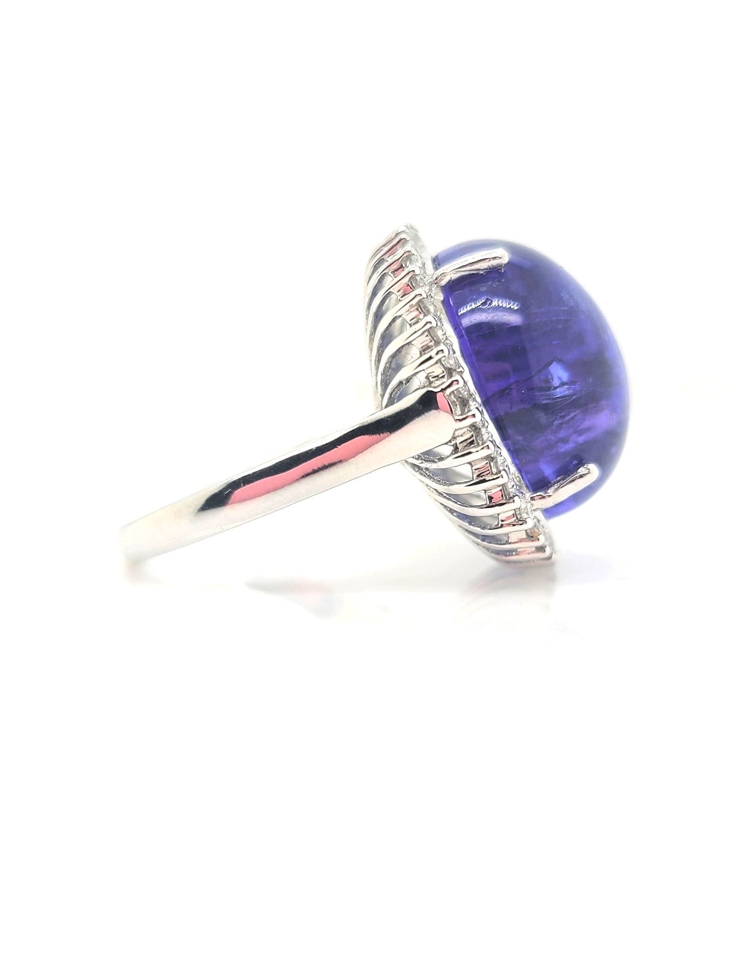 14kt White Gold & 25.67ct Cabochon Tanzanite in Diamond Halo Ring