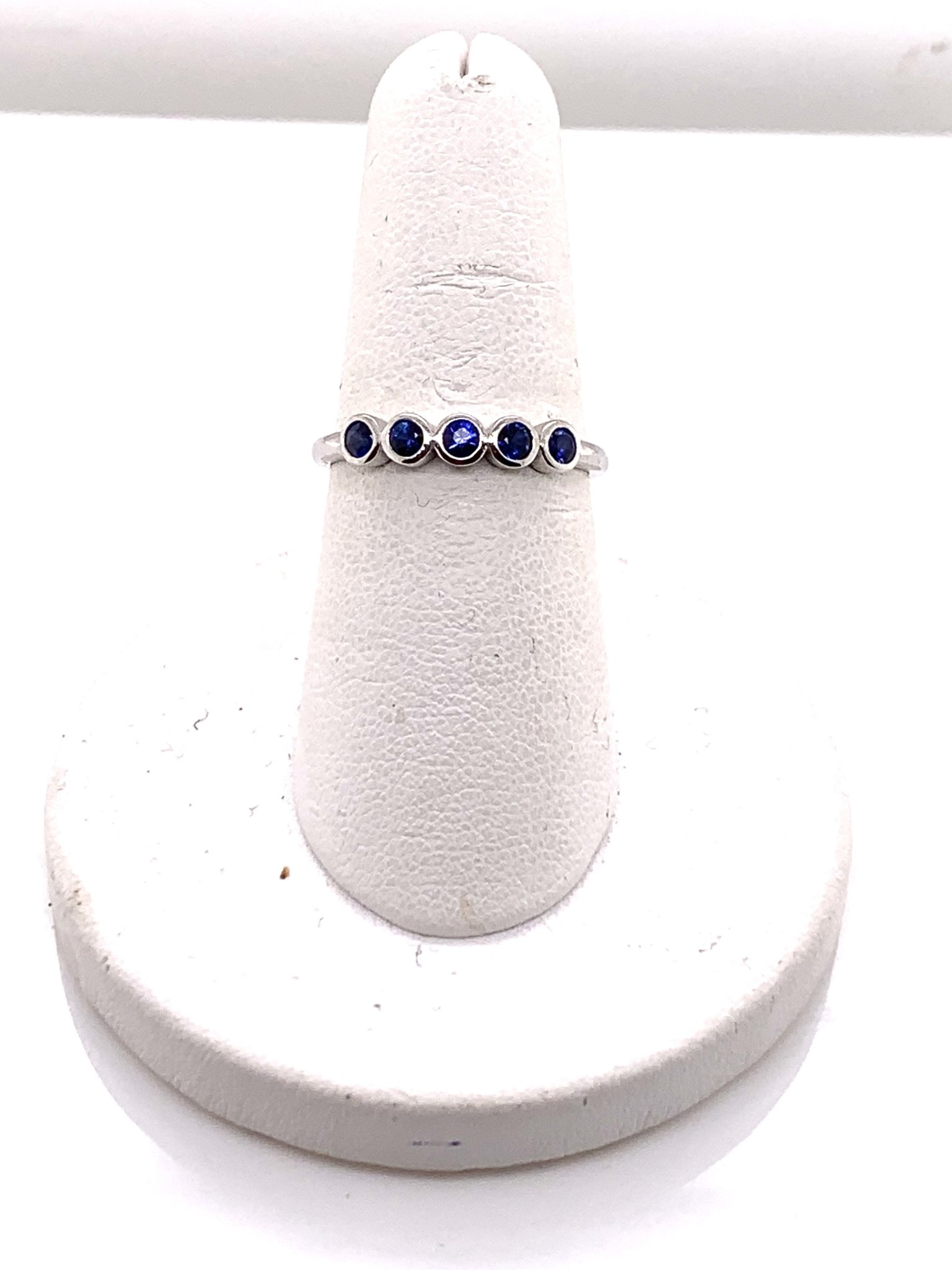 14K white gold 5-sapphire bezel set band size 6.75