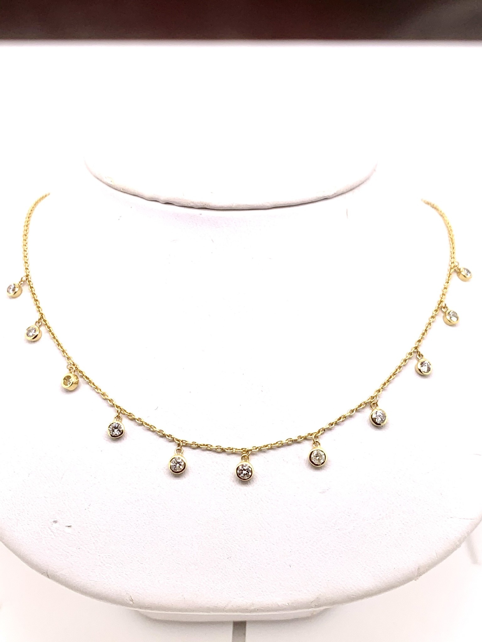 14K yellow gold 1.10ct diamond bezel set dangle necklace 17 in