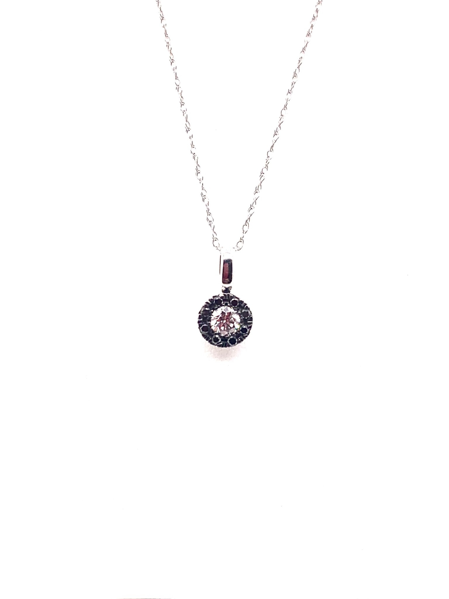 10K white gold 0.20ct diamond with 0.10ct black diamond halo pendant