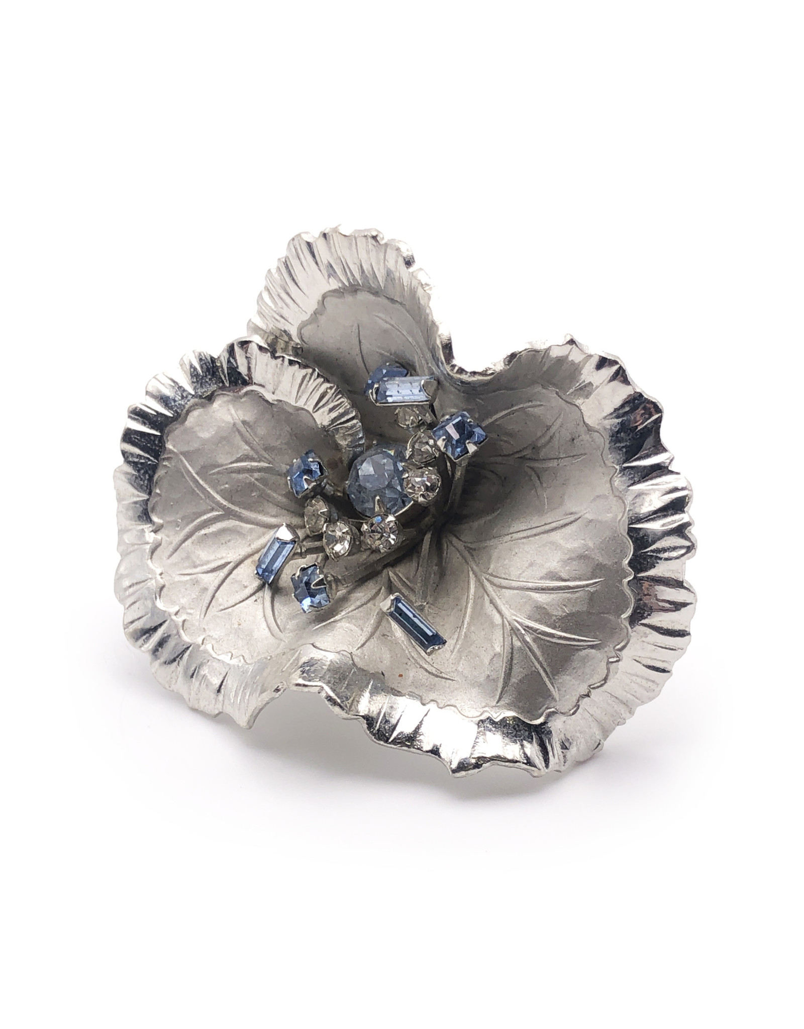 Silver Colored Metal Wavy Flower Brooch with Spray of White & Blue Rhinestones