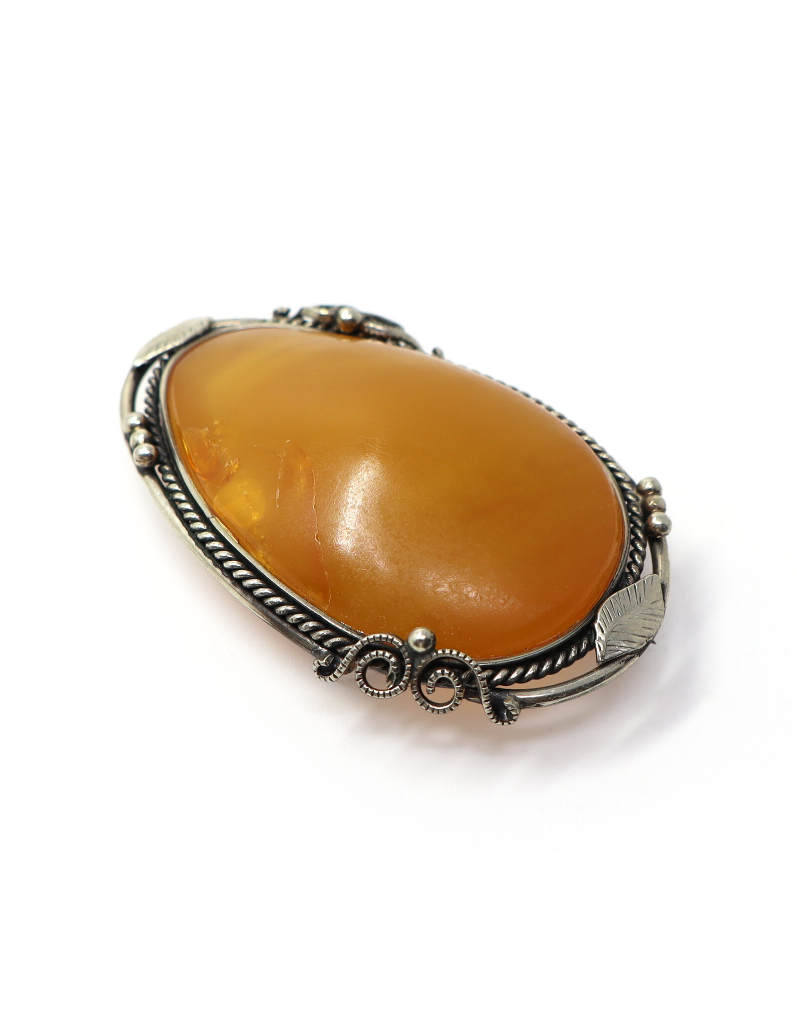 Large Cloudy Amber Brooch with Leafy Frame