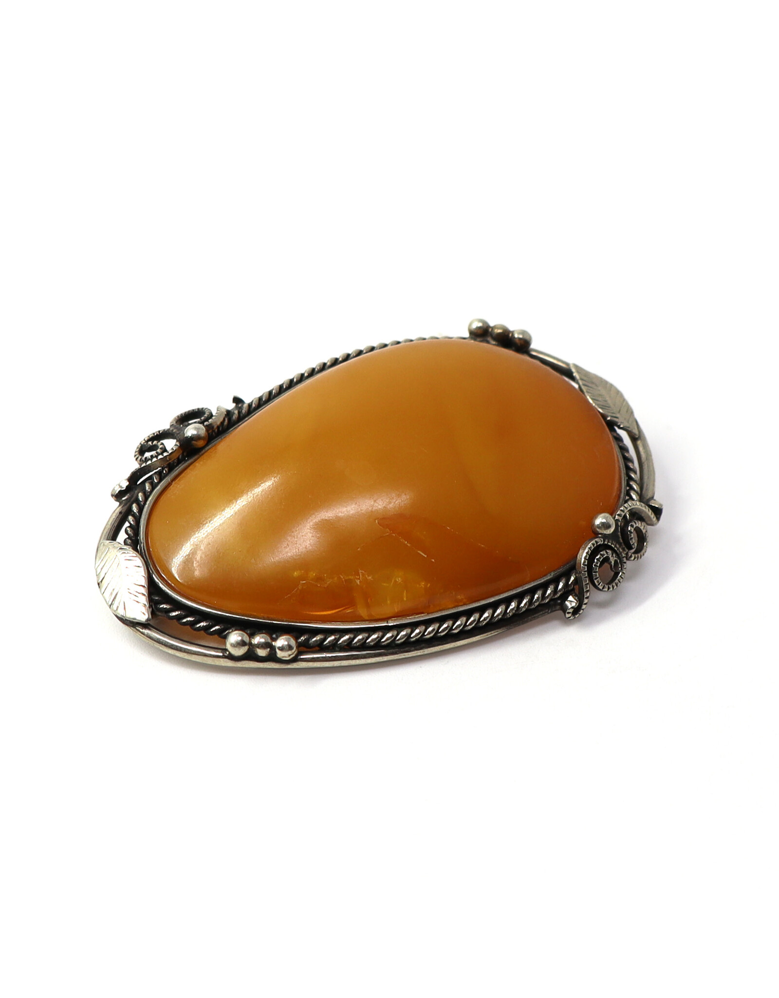 Large Cloudy Amber Brooch with Leafy Frame