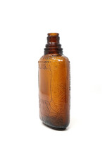 Antique Brown Glass Whiskey Bottle with Raised Spider Web and Wheat Stocks Motif Antique Brown Glass Whiskey Bottle with Raised Spider Web and Wheat Stocks Motif