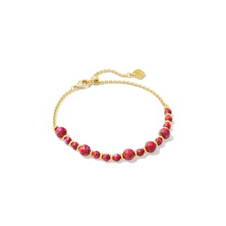 KENDRA SCOTT DESIGN Jovie Gold Beaded Delicate Chain Bracelet in Bronze Veined Red and Fuchsia Magnesite