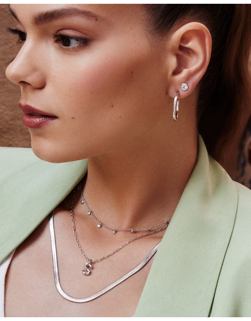 KENDRA SCOTT DESIGN Crystal Letter S Silver Short Pendant Necklace in White Crystal