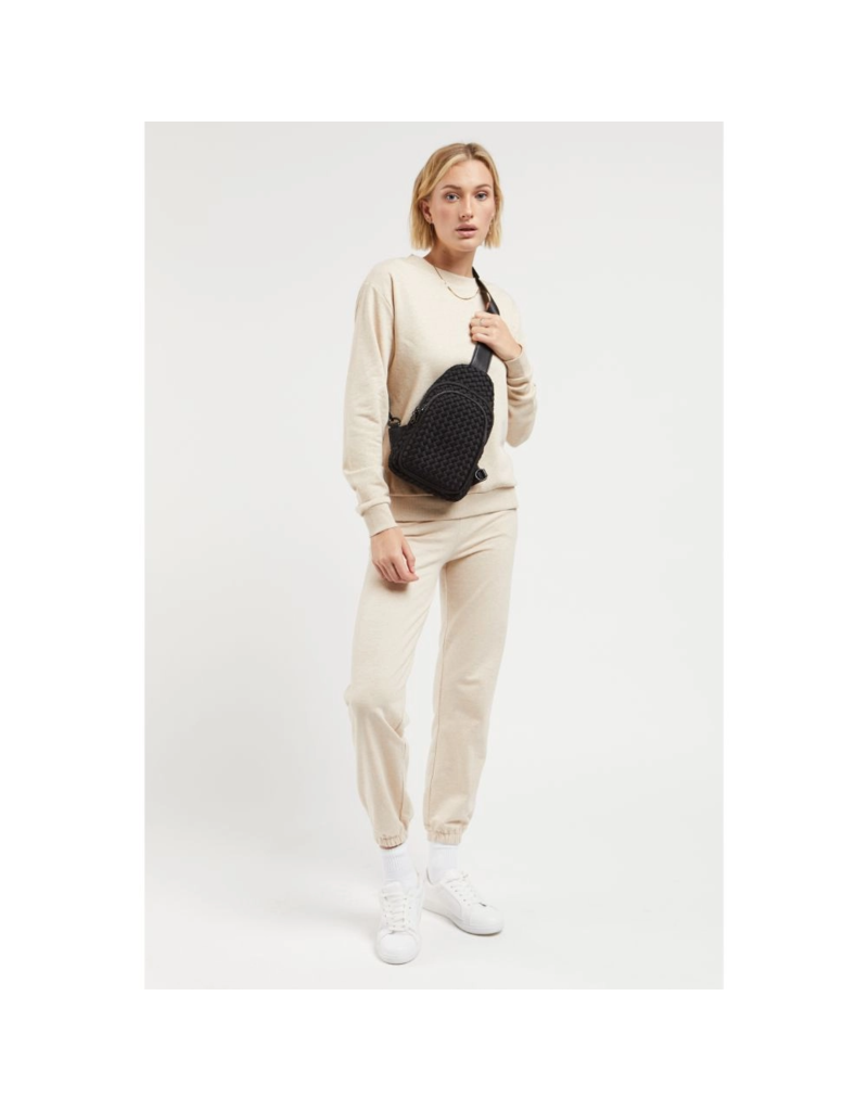 SOL & SELENE Beyond The Horizon Woven Neoprene Sling Backpack in Black