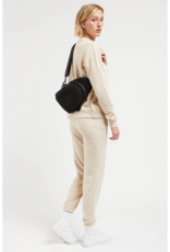 SOL & SELENE Beyond The Horizon Woven Neoprene Sling Backpack in Black