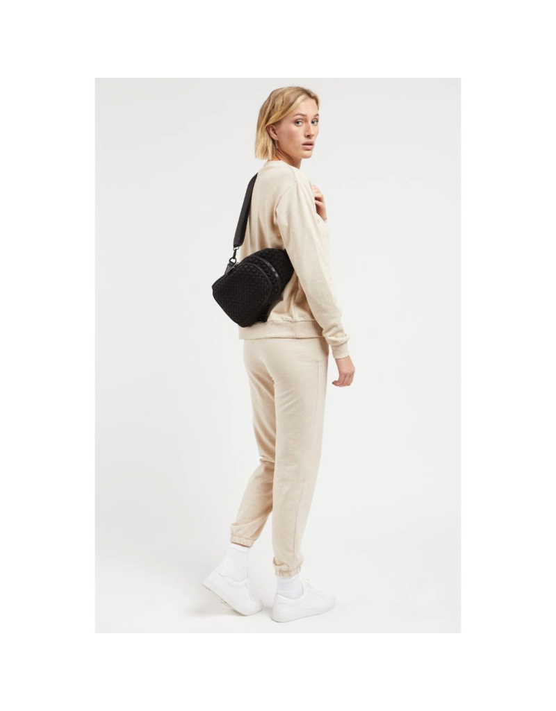 SOL & SELENE Beyond The Horizon Woven Neoprene Sling Backpack in Black