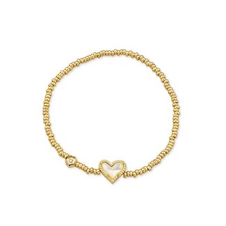 KENDRA SCOTT DESIGN Ari Gold Heart Stretch Bracelet in Ivory Mother-of-Pearl