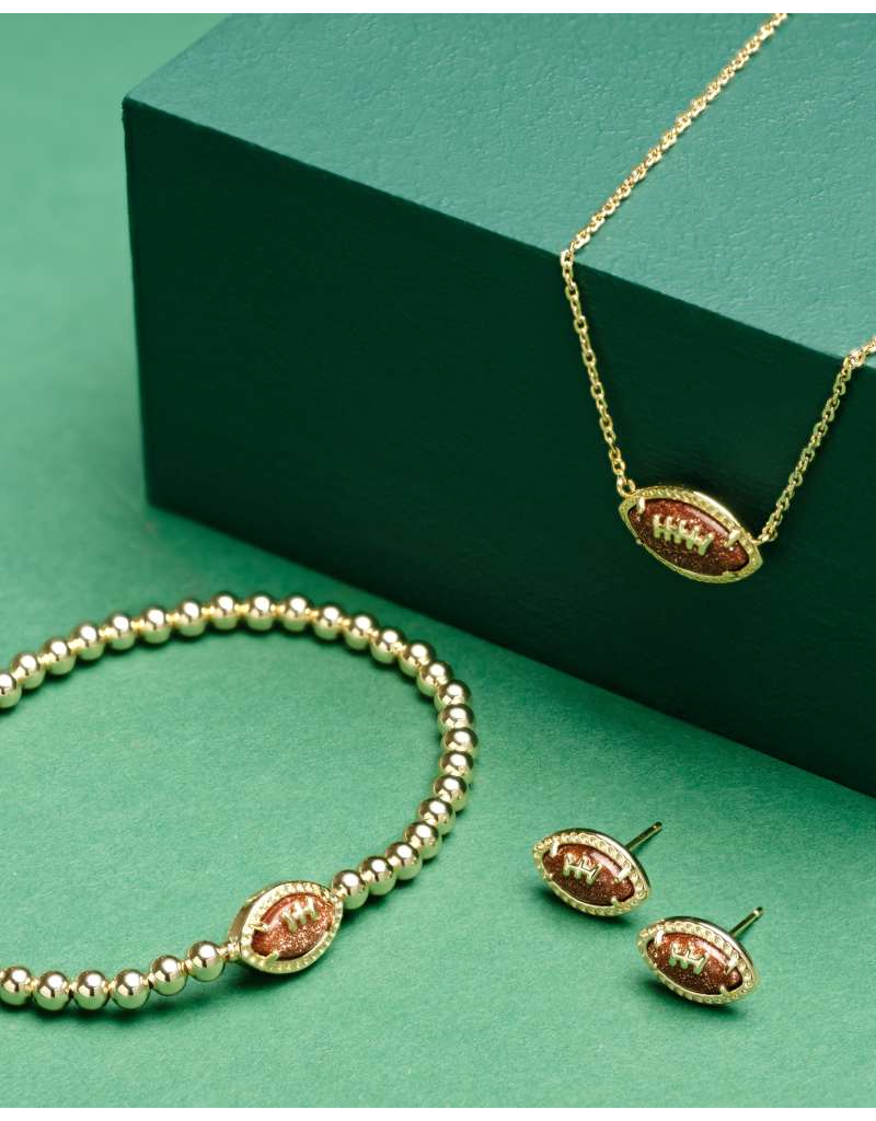 KENDRA SCOTT DESIGN Football Gold Stretch Bracelet in Orange Goldstone