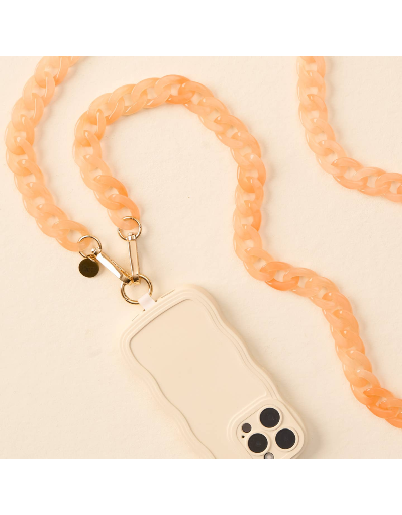 THE DARLING EFFECT Hold The Phone Crossbody Chain in Peach