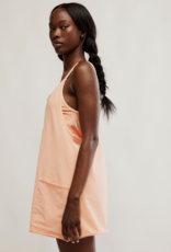 FREE PEOPLE MOVEMENT Hot Shot Mini Dress in Pastel Peach