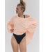 One To Beat Pullover in Pastel Peach