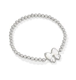 KENDRA SCOTT DESIGN Haley Bow Silver Stretch Bracelet in Ivory Mother-of-Pearl