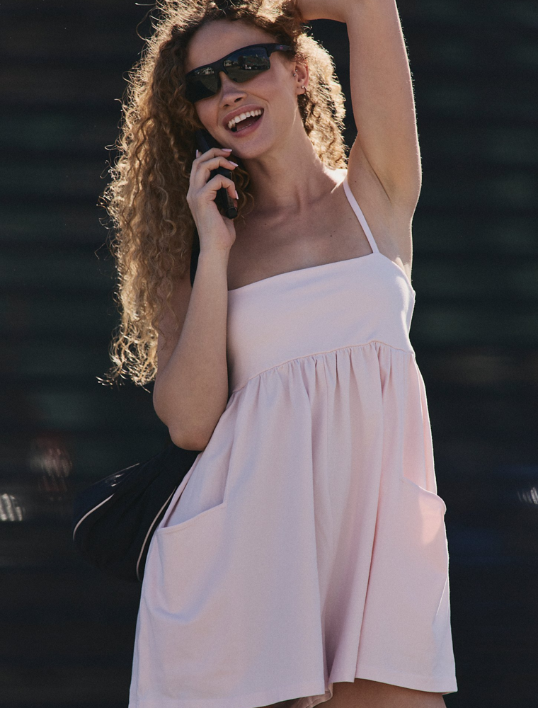 FREE PEOPLE MOVEMENT Hot Shot Strappy Romper in Bloom