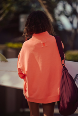 FREE PEOPLE MOVEMENT A Cut Above Mock Neck Pullover Sweatshirt in Neon Coral