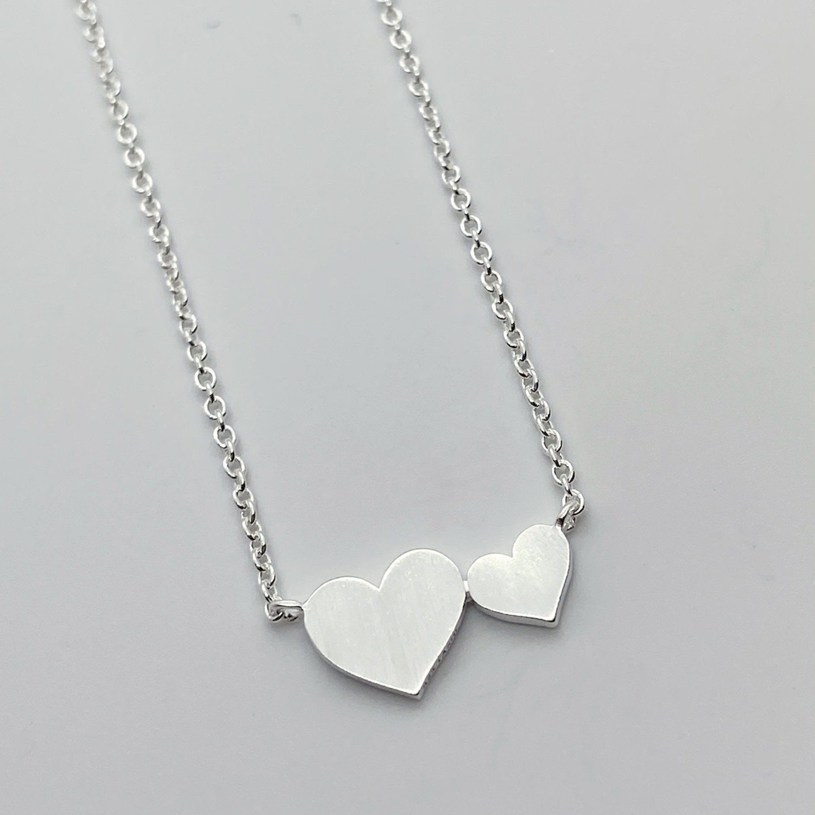 Brushed Sterling Silver Big and Little Hearts Necklace