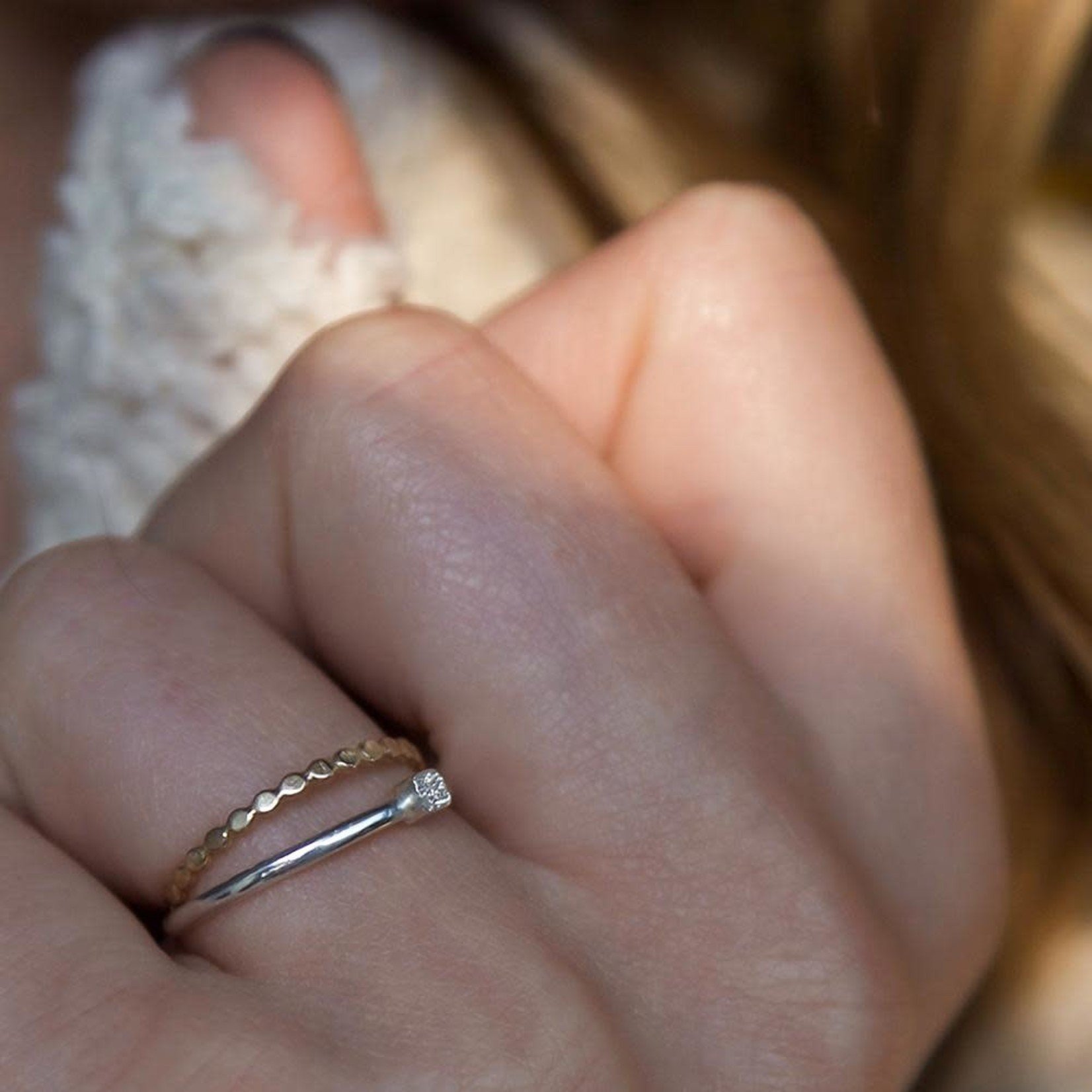 thin silver ring with diamonds