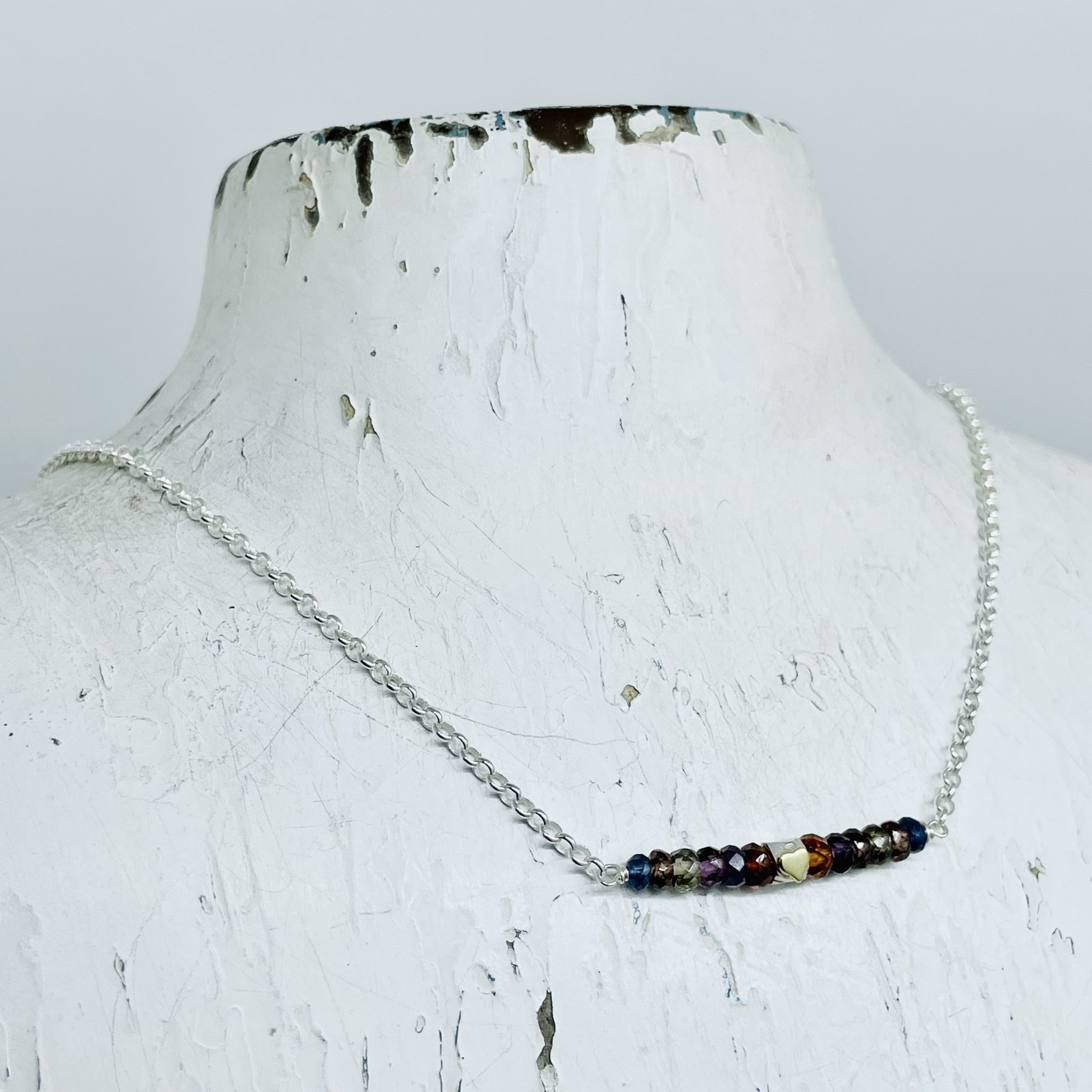 Handmade Necklace with multi sapphire, faceted silver with brass heart