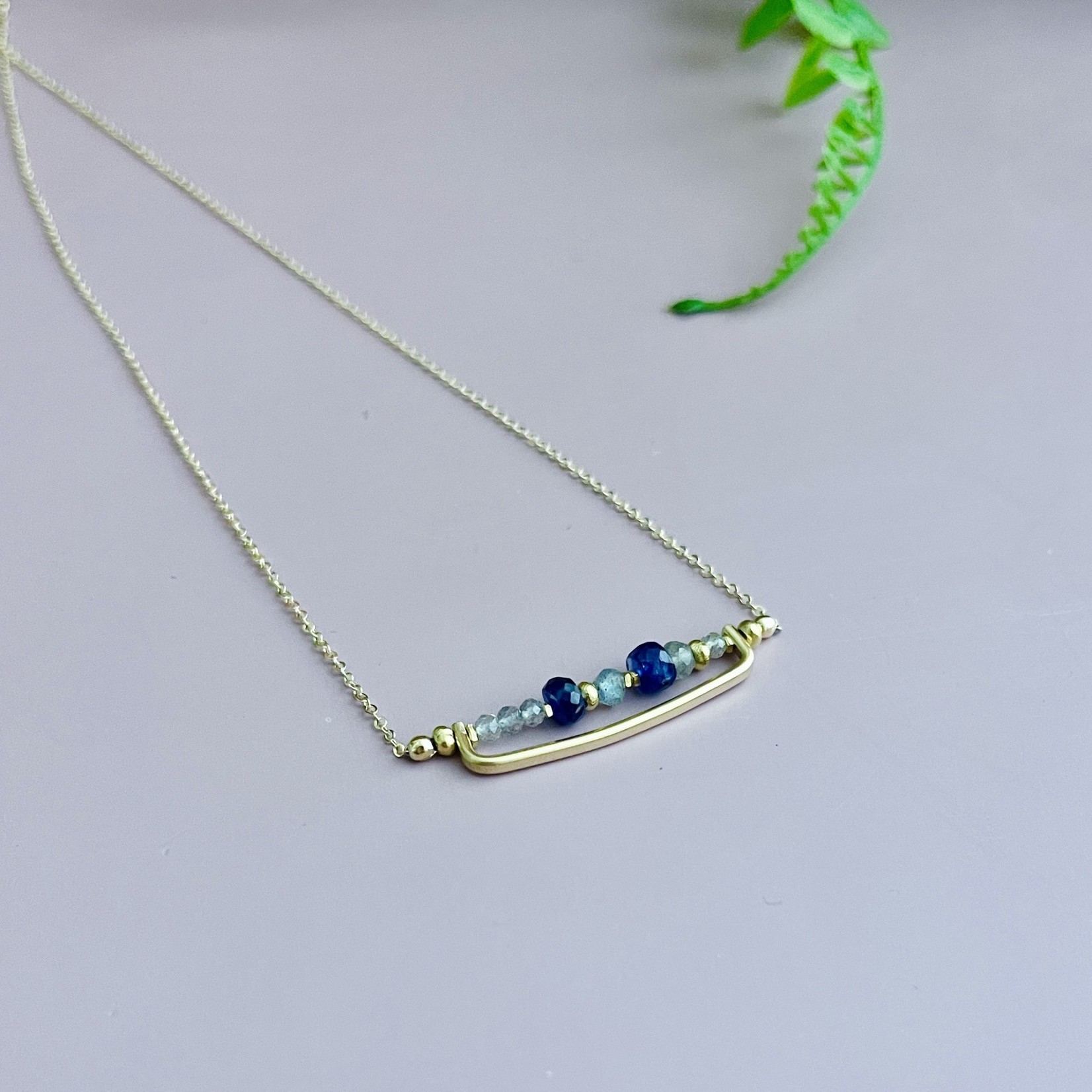 J&I Handmade 14k gold filled bar with faceted blue sapphire and labradorite necklace. 16" L