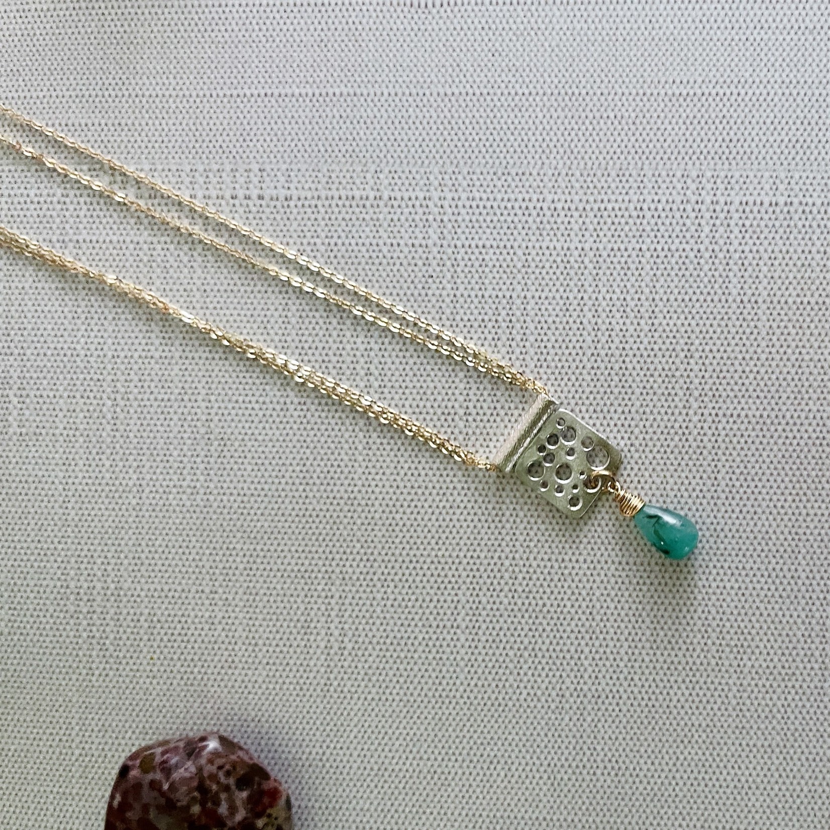 Handmade Necklace with brushed square with circles, double 14 k g.f. chain, emerald briolette