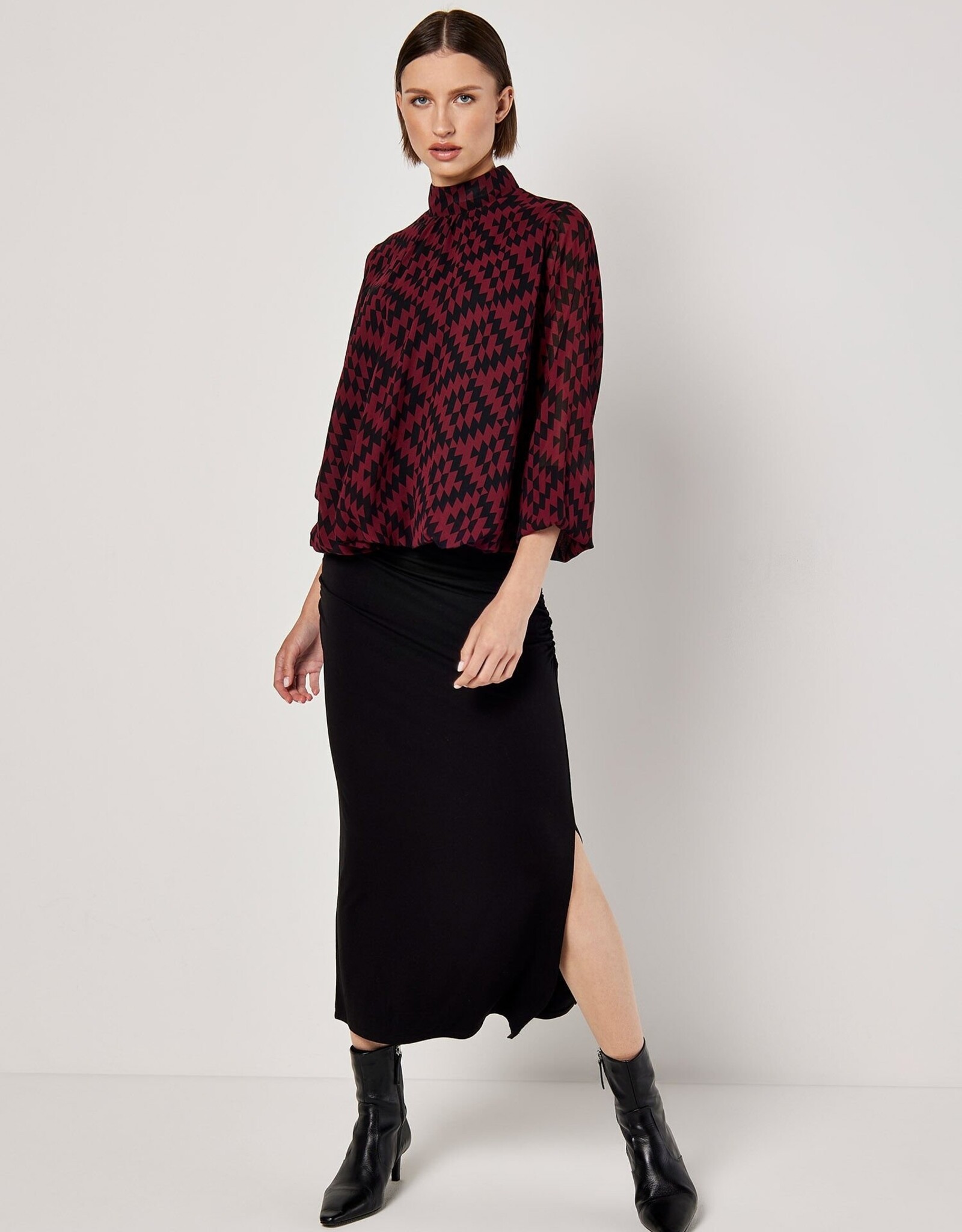 Apricot Staggered Geo High Neck Puff Top