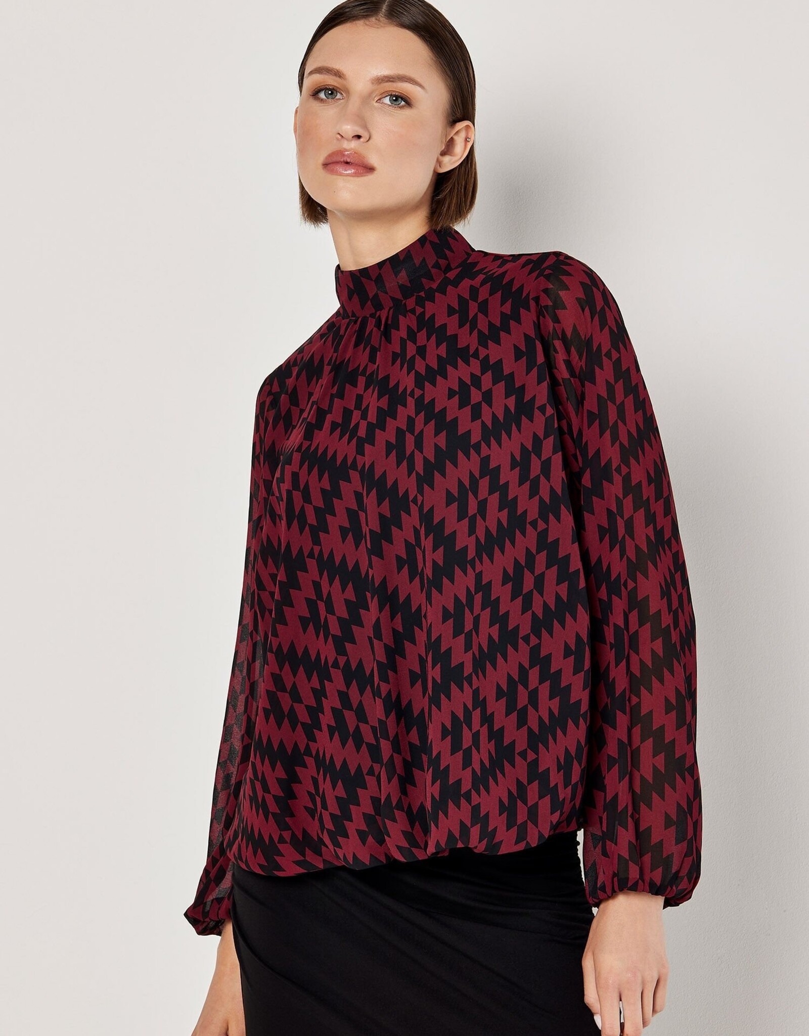 Apricot Staggered Geo High Neck Puff Top
