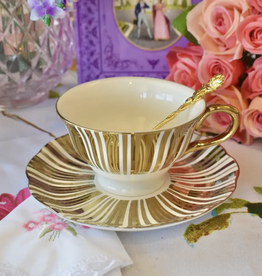White and Gold Teacup and Saucer