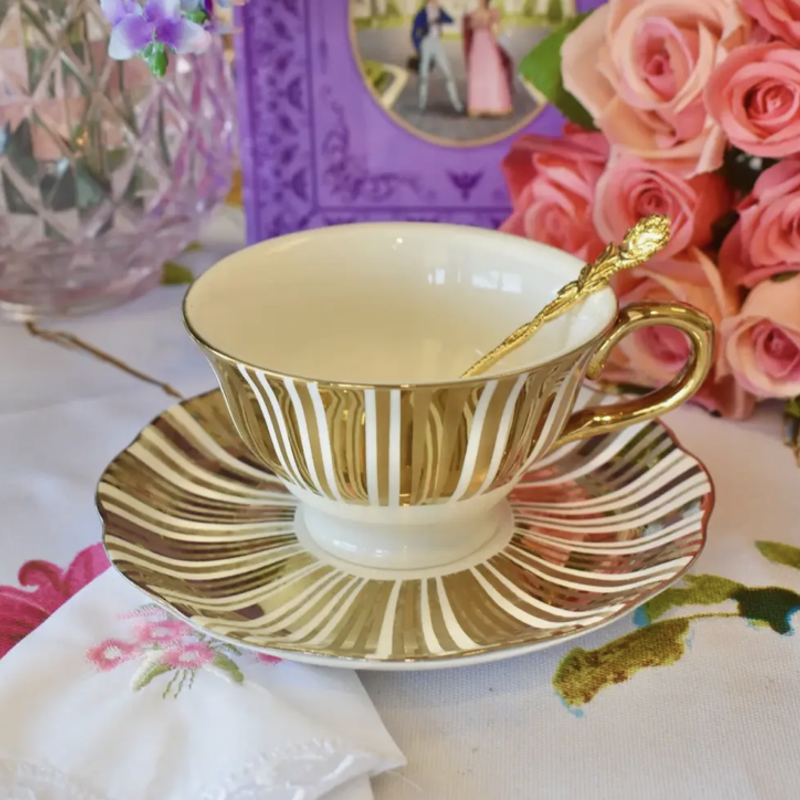 White and Gold Teacup and Saucer