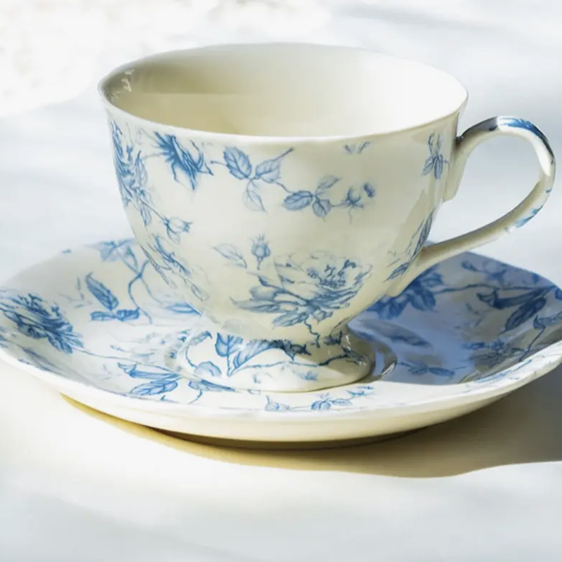 Blue and White Floral Teacup and Saucer