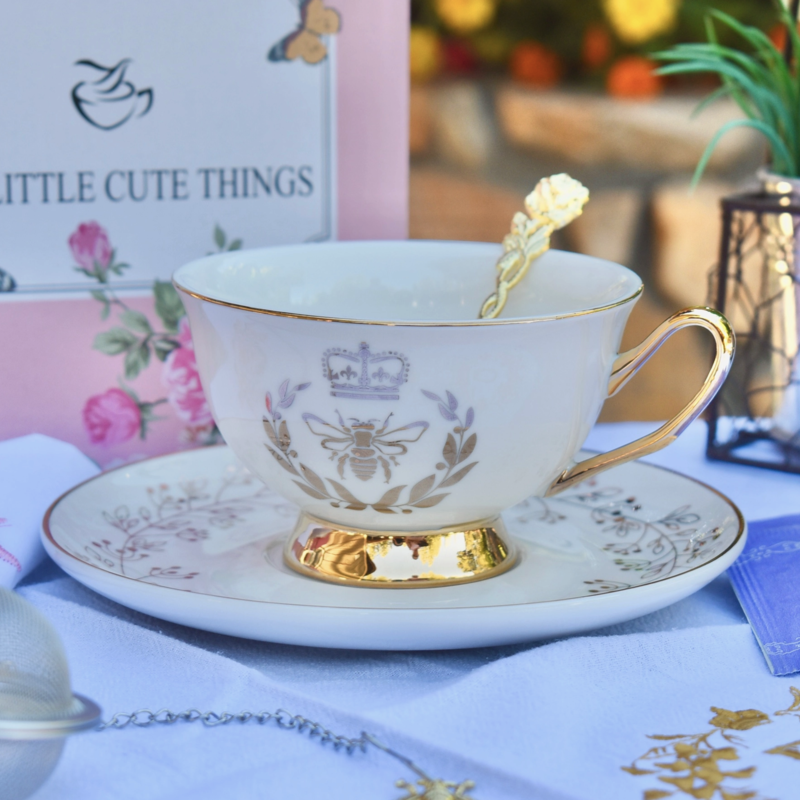 Queen Bee Ivory Pearl with Gold Teacup and Saucer