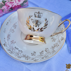 Queen Bee Ivory Pearl with Gold Teacup and Saucer