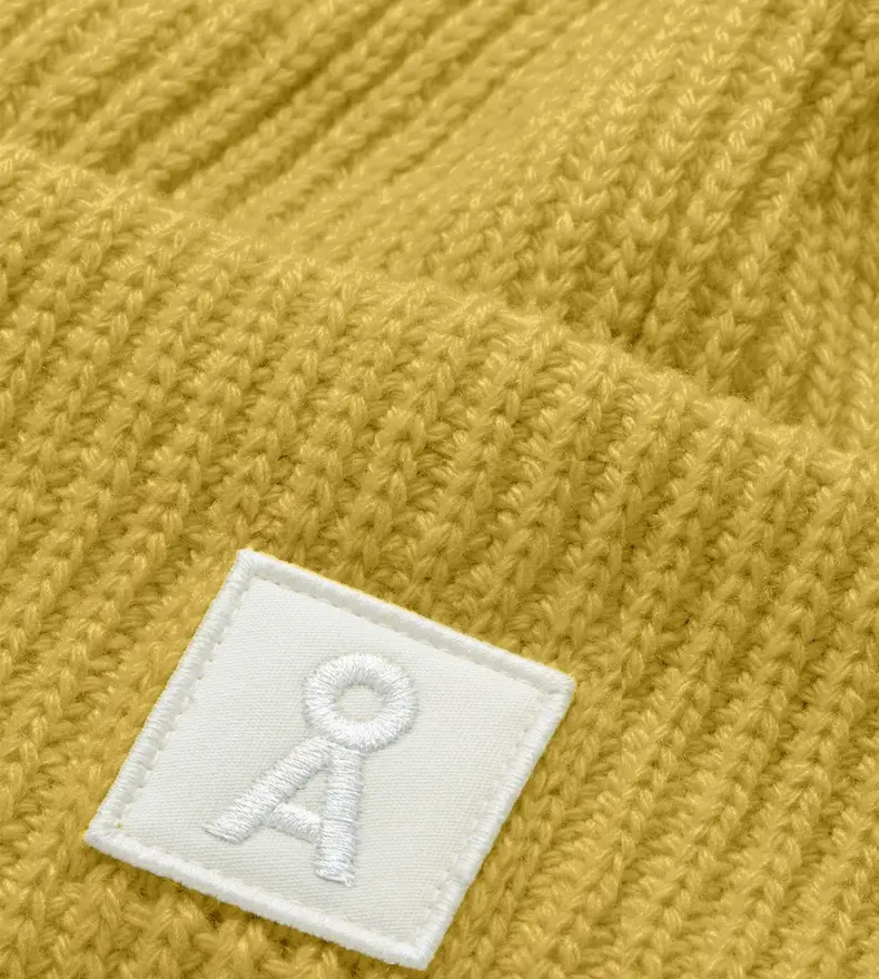 TUQUE EN LAINE ICONIC Å