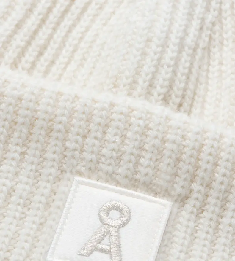 TUQUE EN LAINE ICONIC Å
