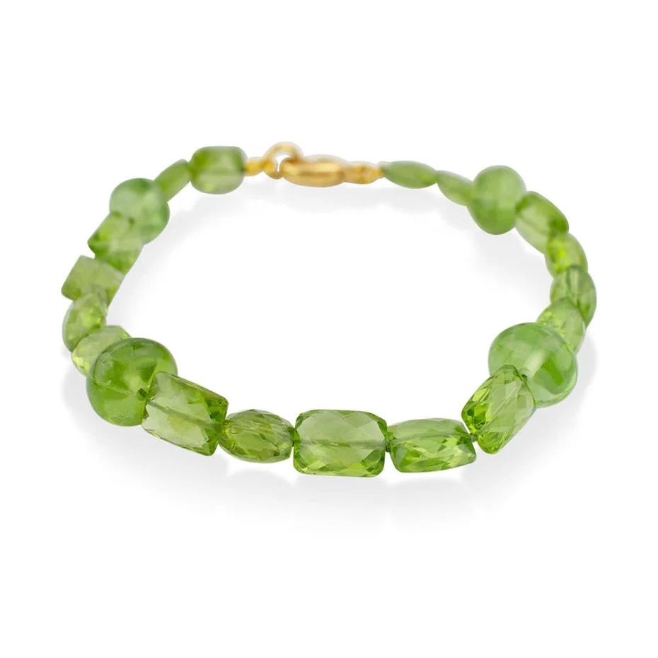 Peridot and gold bracelet