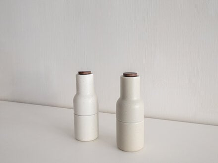 Audo Norm at Mjölk: Audo Ceramic and Walnut Bottle Grinders (Set of 2)
