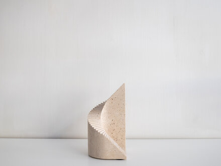 Norm at Mjölk: Origin Made Spiral Sculpture Roman Travertine