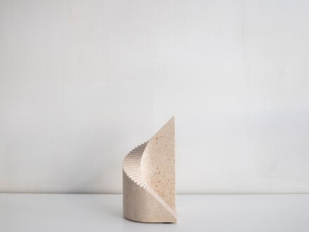 Origin Made Norm at Mjölk: Origin Made Spiral Sculpture Roman Travertine