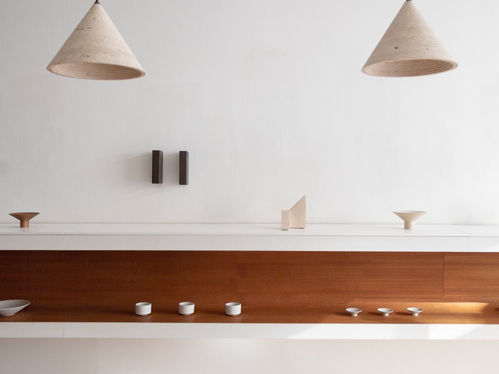 Norm at Mjölk: Origin Made Ark Lamp in Travertine Stone