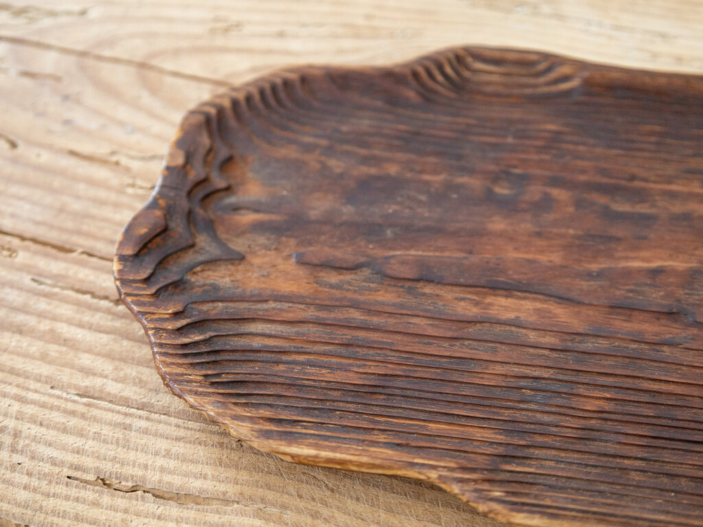 A striking worn cedar tray
