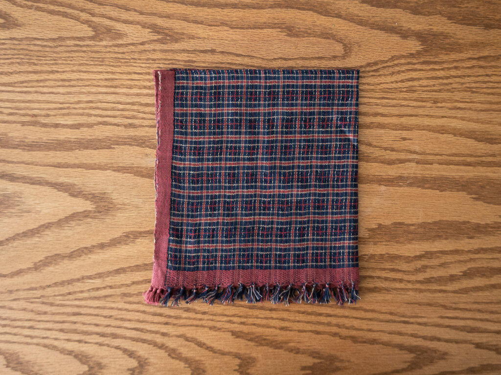 Handspun lightweight cotton cloth, red border