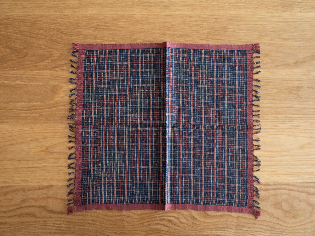Handspun lightweight cotton cloth, red border