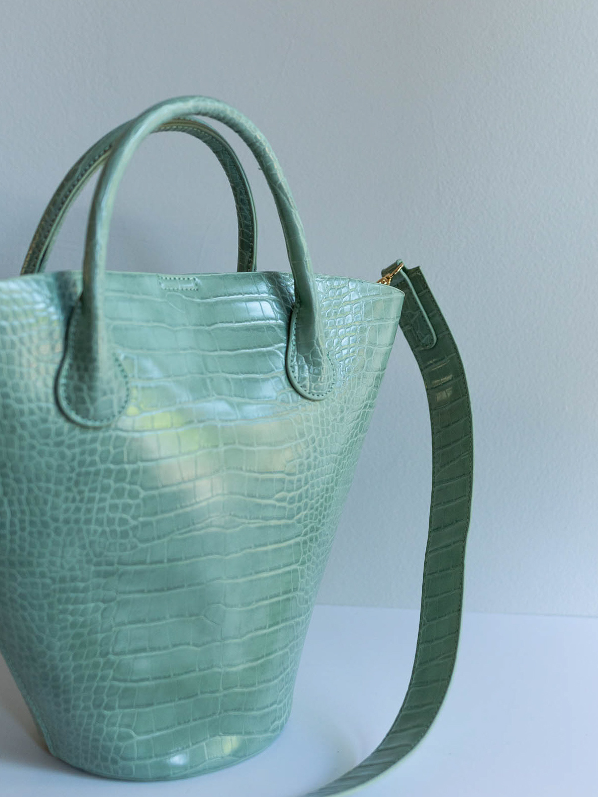 zip around crossbody bag